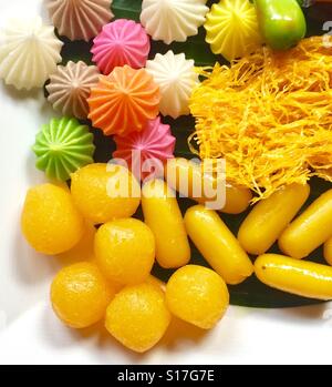 Colourful traditional Thai dessert made from flour mixed with egg yolk and sugar Stock Photo