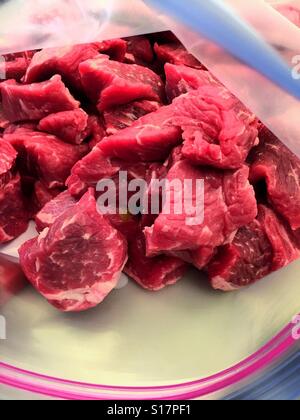 Close up of sirloin beef chunks in Ziploc bag USA Stock Photo