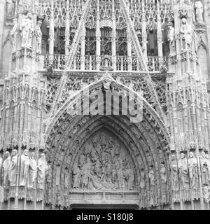 Gothic facade of Rouen Cathedral, France, black and white Stock Photo