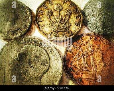 Worn, pre-decimal British coins Stock Photo