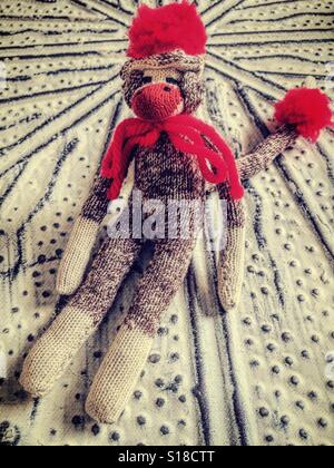 Miniature sock monkey toy, USA Stock Photo