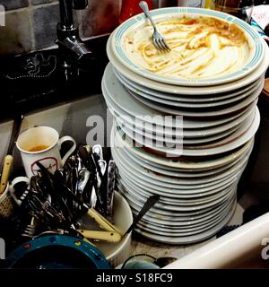 Pile of dirty dishes in sink Stock Photo: 61246984 - Alamy