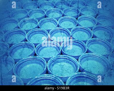 Blue plastic bottle caps in grunge Stock Photo