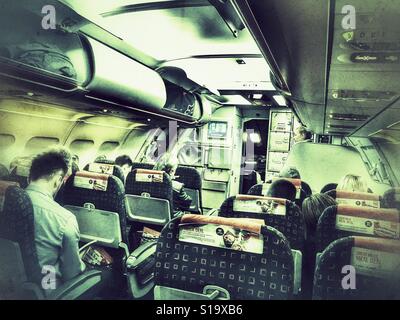 EasyJet flight, cabin scene prior to take off, waiting for more passengers. Stock Photo