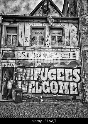 Refugees welcome , street art in Weimar, Germany Stock Photo