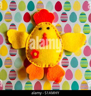 Homemade Easter Chick on Egg Background Stock Photo
