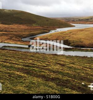 Car driving through the Elan Valley Mid Wales in winter U.K. Stock Photo