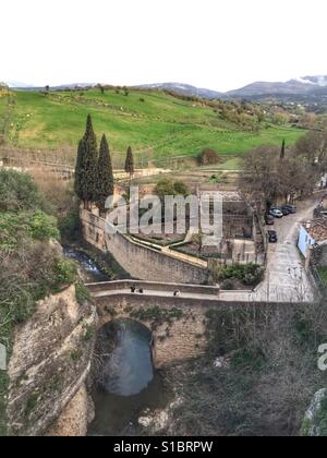 View of the Arab baths from the top of the gorge in Ronda, Andalucia, Southern Spain Stock Photo