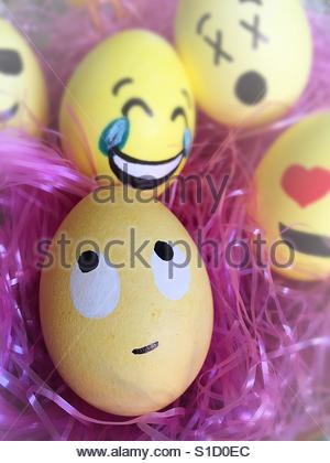 Easter basket filled with emoji Easter eggs, USA Stock Photo