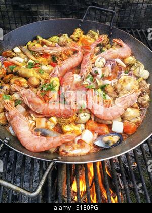 Cooking paella. Stock Photo