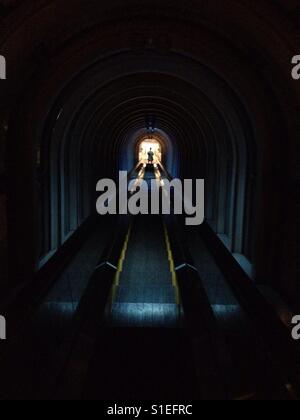 The girl in the tunnel. Stock Photo