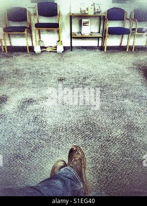 POV Waiting at the doctors surgery Stock Photo