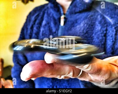 Fidget spinner, spinning Stock Photo