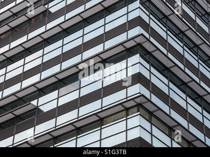 A part of a skyscraper that makes abstract patterns Stock Photo