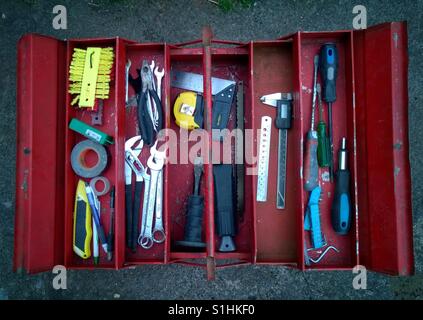Toolbox. Retro red metal tool box. Stock Photo