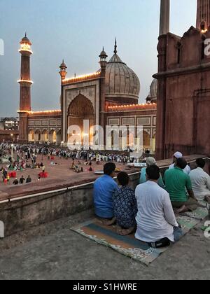 Muslims offering prayers on the last day of Ramadan at Jama Masjid, New Delhi, India Stock Photo