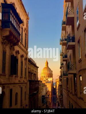 The Basilica of Our Lady of Mount Carmel in Valletta during sunset. Stock Photo