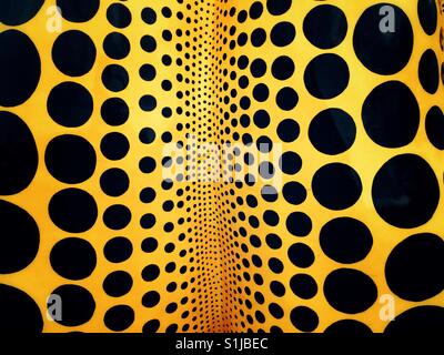 Closeup view of yellow and black pumpkin by Yayoi Kusama on Naoshima island in Japan Stock Photo