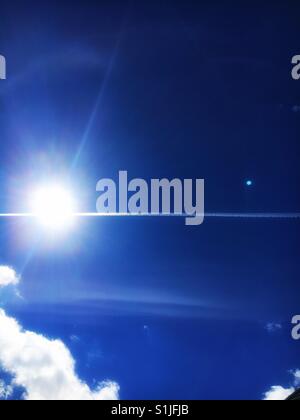 Bright sun, blue sky Stock Photo