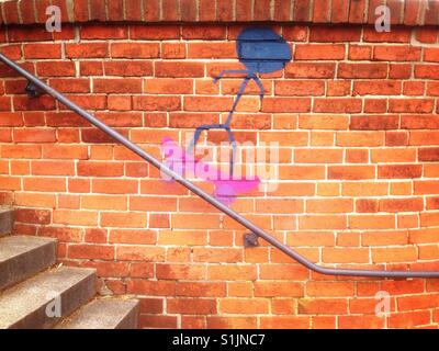 Skater Graffiti on a red brick wall Stock Photo