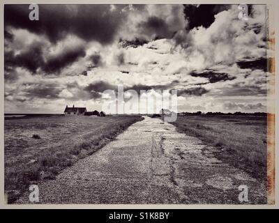 Wartime concrete road, Shingle Street, Suffolk, England. Stock Photo