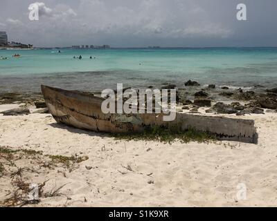 Abandoned Boat on Beautiful White Sand and Aqua Blue Ocean and Beach Front Stock Photo