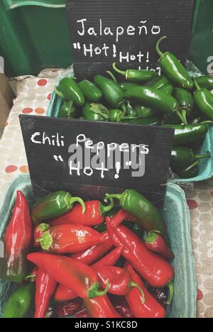 Assortment of hot peppers at a farmer's store. Stock Photo