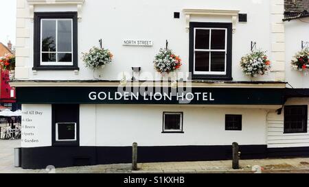 The golden lion hotel is an old traditional English pub, built in 16th century in Romford, Essex, uk Stock Photo