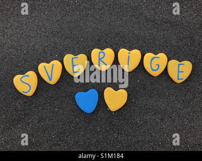 Sverige, Sweden, country name with national colors and heart stones letters Stock Photo