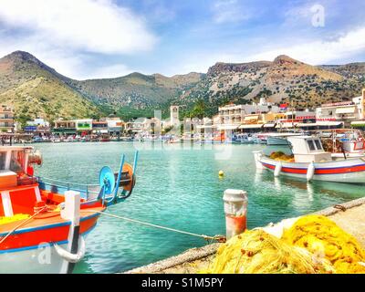 Fishing boats in Elounda harbour, Crete, Greece Stock Photo