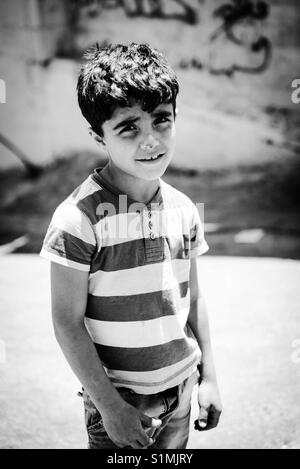 A refugee child in Aida Camp in Bethlehem, Palestine. Stock Photo