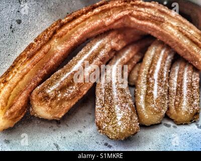 Churros, deep fried dough pastry Stock Photo