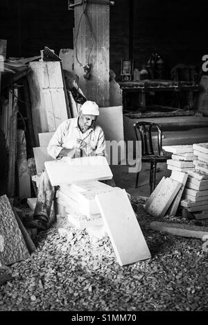 A worker in a marble factory in Aida refugee camp in Bethlehem, Palestine. Stock Photo