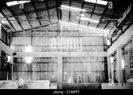 A warehouse riddled with bullet holes in Aida refugee camp in Bethlehem following the second intifada of 2002. Stock Photo