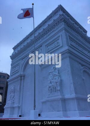 A snow sculpture of the Arc de Triomphe at Sapporo Snow Festival. Stock Photo