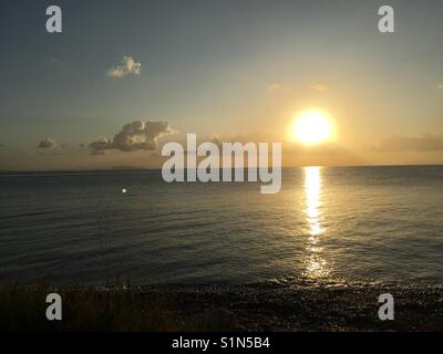 Sunrise from Skala on Kefalonia island in Ionian Sea in Greece Stock Photo