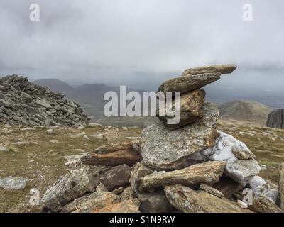 Cairn on footpath of Glyder Fach, Snowdonia Stock Photo