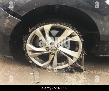 Blown out tyre Stock Photo