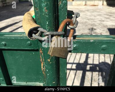 Padlock on a church gate in Kaligata on Kefalonia in Greece Stock Photo
