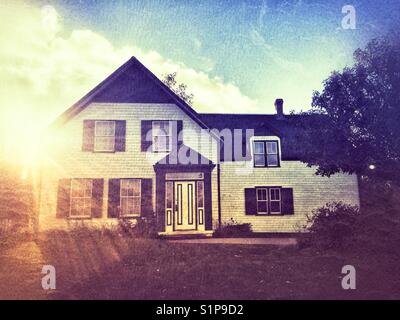 Green Gables House as the sun goes down in Cabendish, Prince Edward Island, Canada. Stock Photo