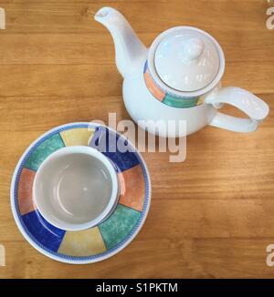 Colourful teapot and cup Stock Photo