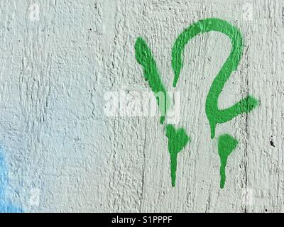 Graffiti of an exclamation mark and a question mark Stock Photo