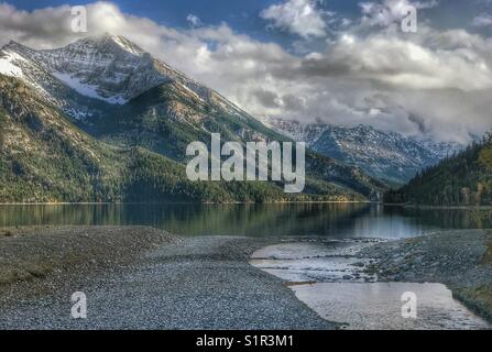 Upper Waterton Lake - looking towards the USA, from the beach by Cameron Creek. Waterton Lakes national park, Alberta, Canada. Stock Photo