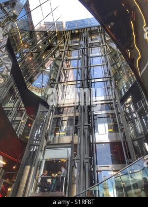 People travel in a lift at 1, New Change owned by Land Securities in London, England