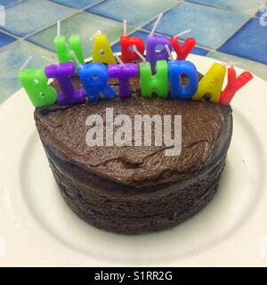 Small chocolate birthday cake Stock Photo