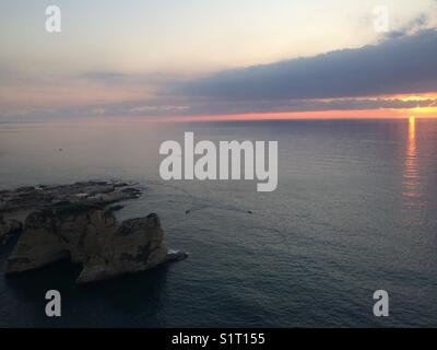 Sunset over Pigeons Rocks in Beirut, Lebanon Stock Photo