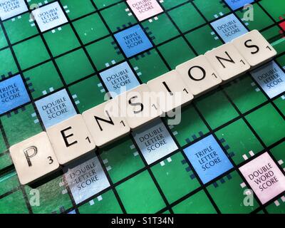 The word pension written with Scrabble tiles Stock Photo
