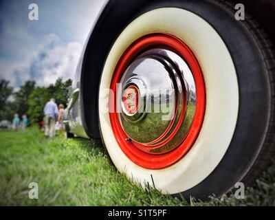 Classic Cadillac Wheel Reflection Stock Photo