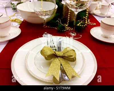 Dinner table setting ready for christmas celebration Stock Photo
