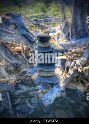 Stones stacked into a cairn Stock Photo